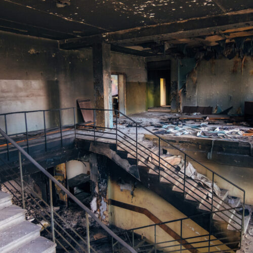 Burned interiors after fire in industrial or office building