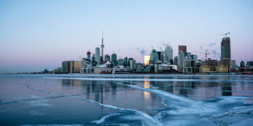 The skyline of Toronto looking across a frozen Lake Ontario